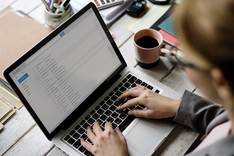 User browsing her secure emails