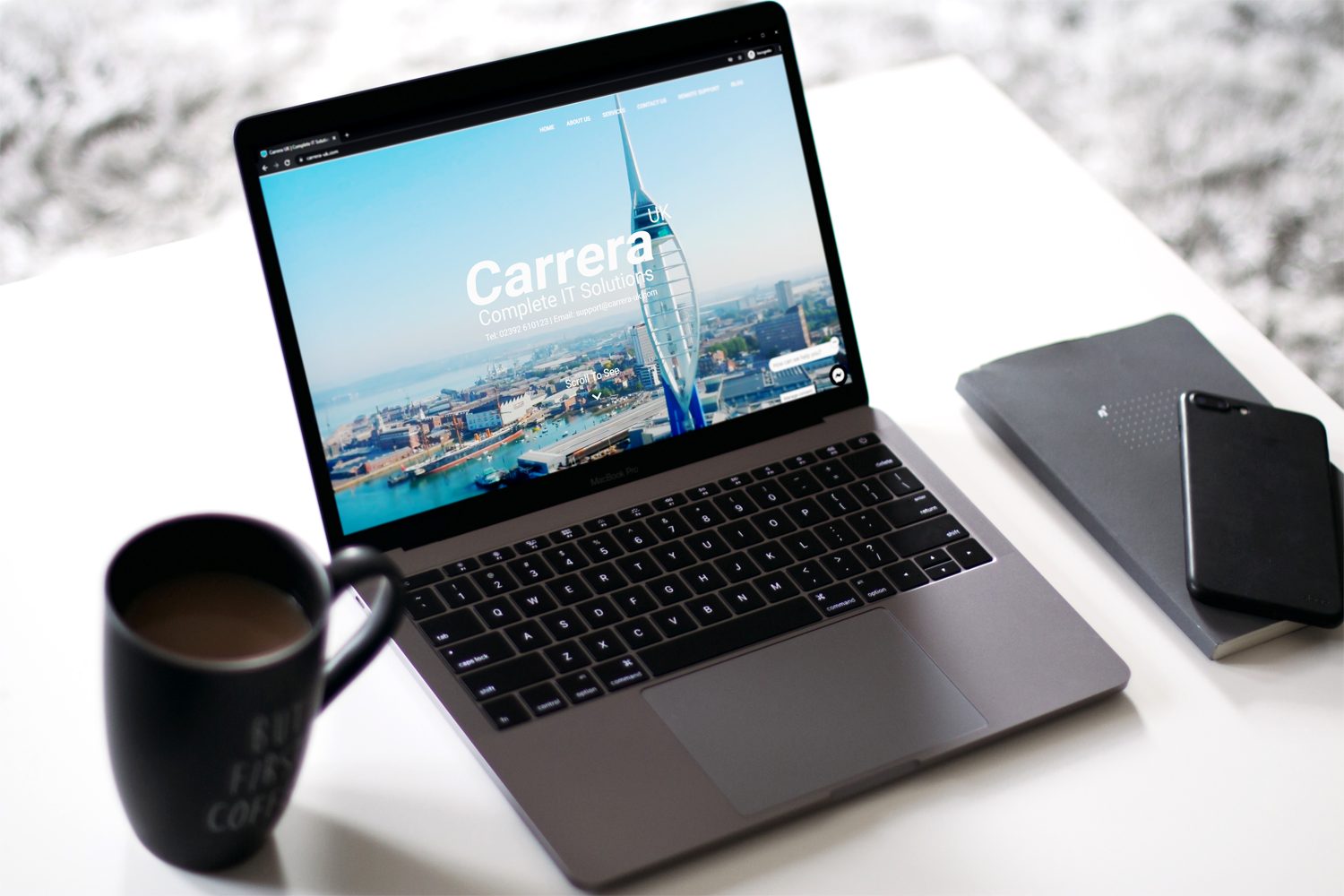 Carrera UK designed responsive website viewed on a laptop