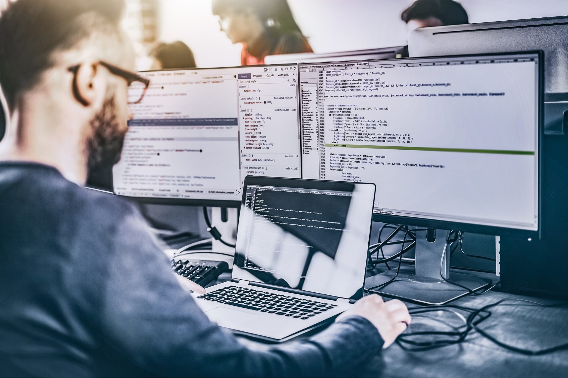 Man at His Desk Providing Remote IT Support in Portsmouth, Hampshire